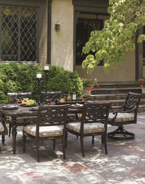Black sands dining table and dining chairs luxury outdoor living by hausers patio