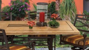 Outdoor chairs by decorated table by Hauser's Patio
