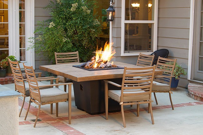 outdoor dining fire table Hausers Patio