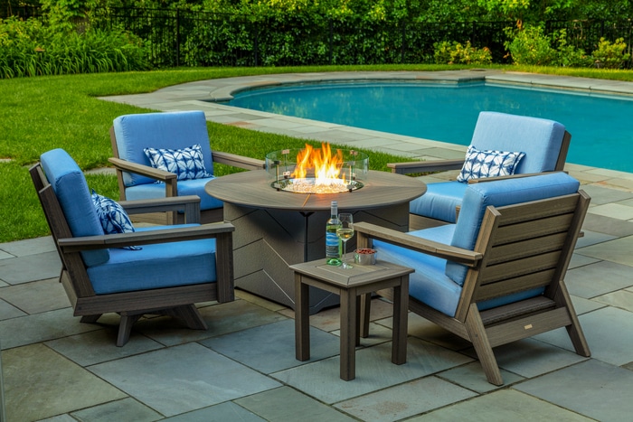 Aura teak fire table luxury outdoor living by hausers patio