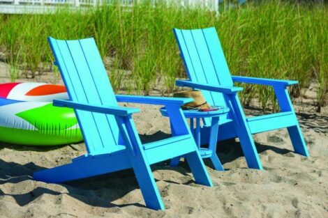 Blue adirondack chairs on beach by hausers patio luxury outdoor living by hausers patio