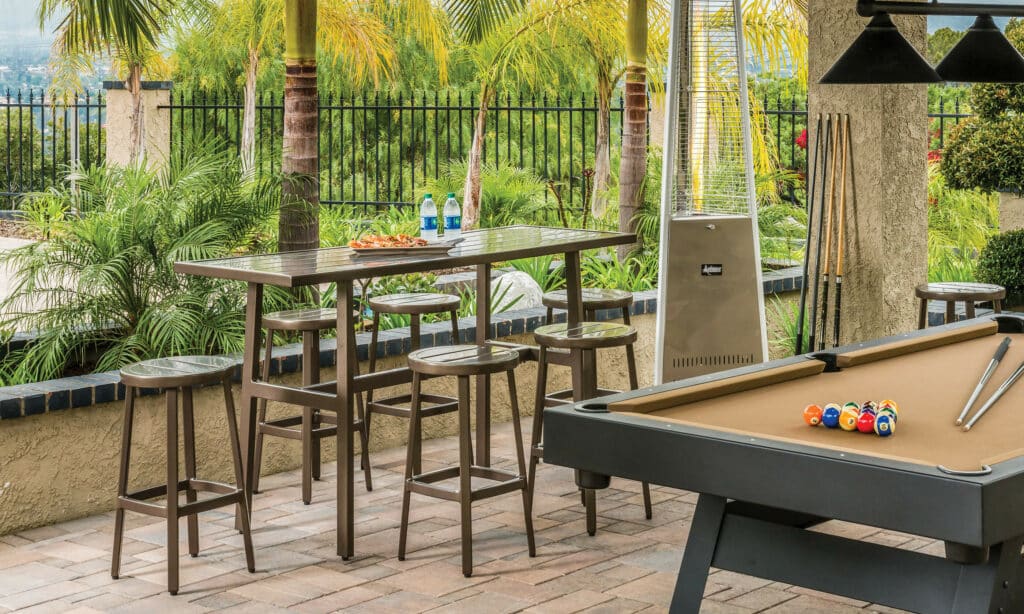 Outdoor bar height table and chairs by pool table by hauser luxury outdoor living by hausers patio's Patio
